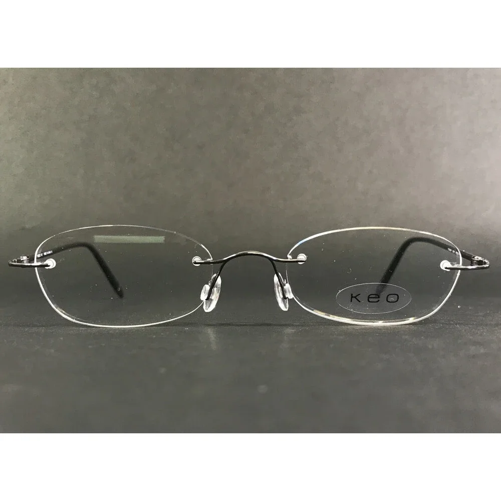 Keo Eyeglasses Frames 107 SGUN Satin Gunmetal Rimless Oval Titanium 47-20-140